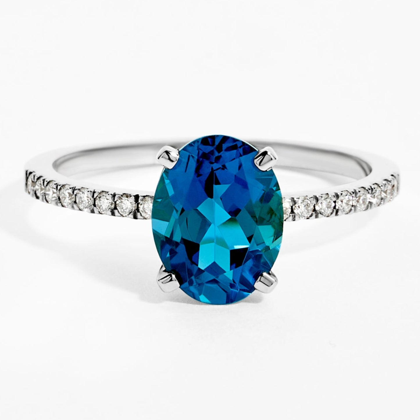 Oval London Blue Topaz & Diamond Solitaire Ring in White Gold