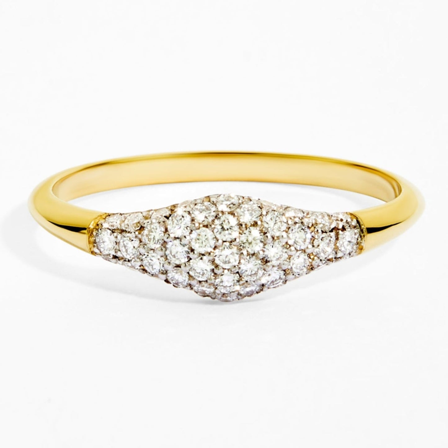 Gold ring with diamond accents on a white background