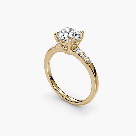 Solitaire with Shoulder Accents Round in Yellow Gold