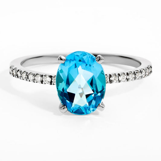 Oval Swiss Blue Topaz & Diamond Solitaire Ring in White Gold