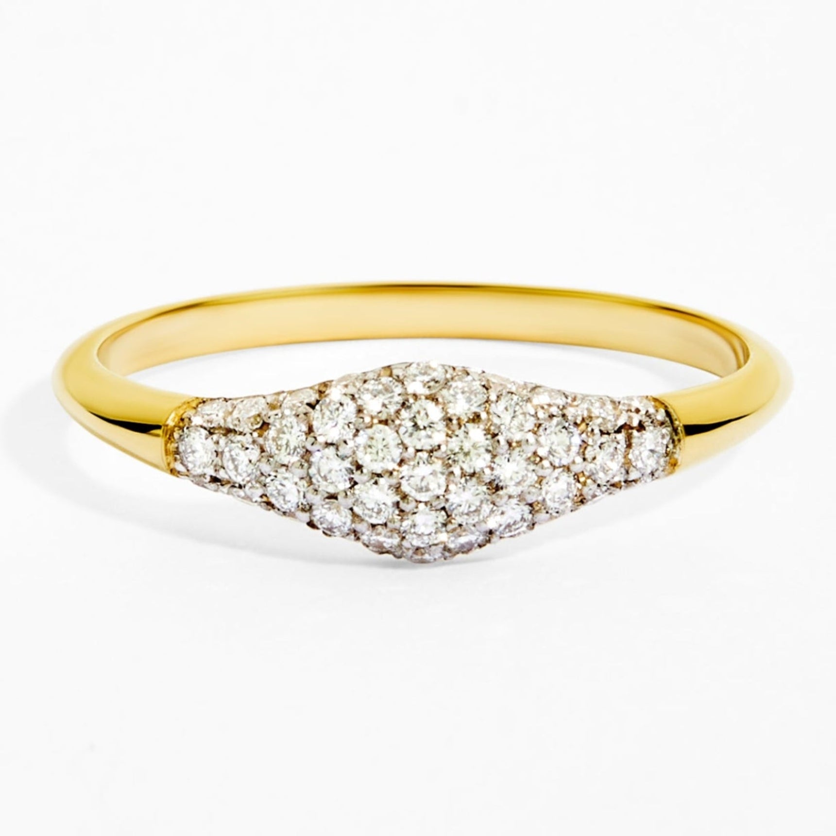 Gold ring with diamond accents on a white background