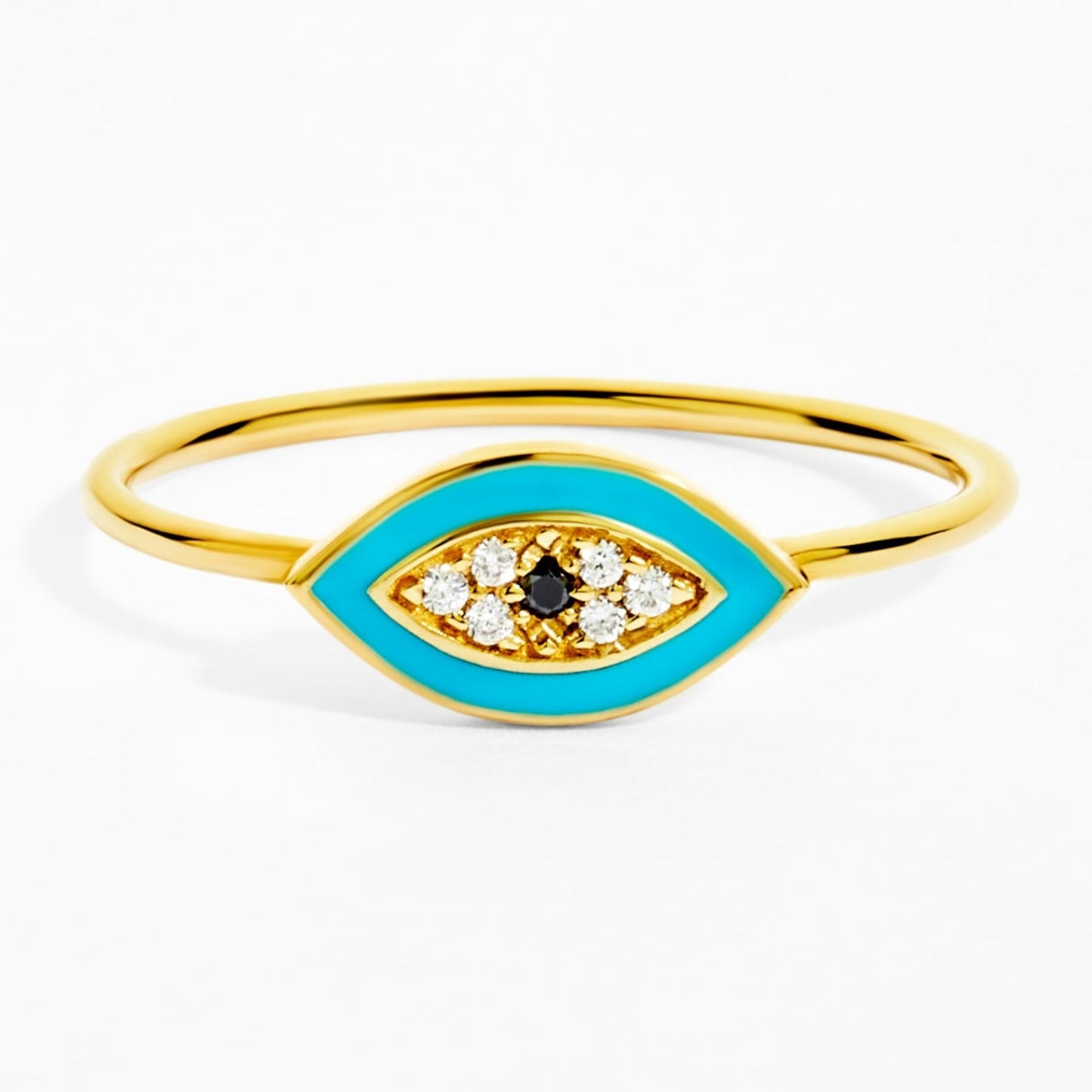Gold ring with blue enamel and gemstones on a white background