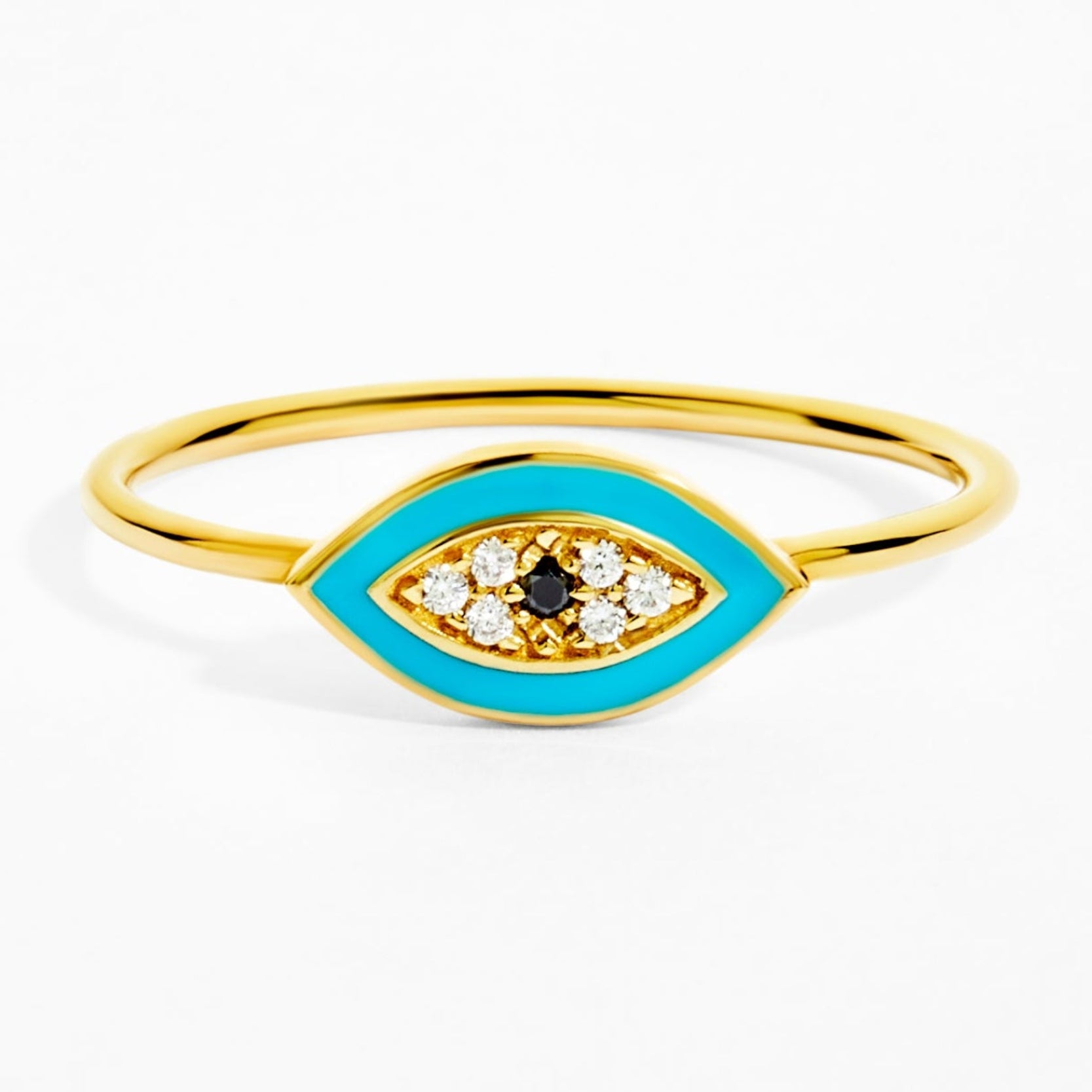 Gold ring with blue enamel and gemstones on a white background