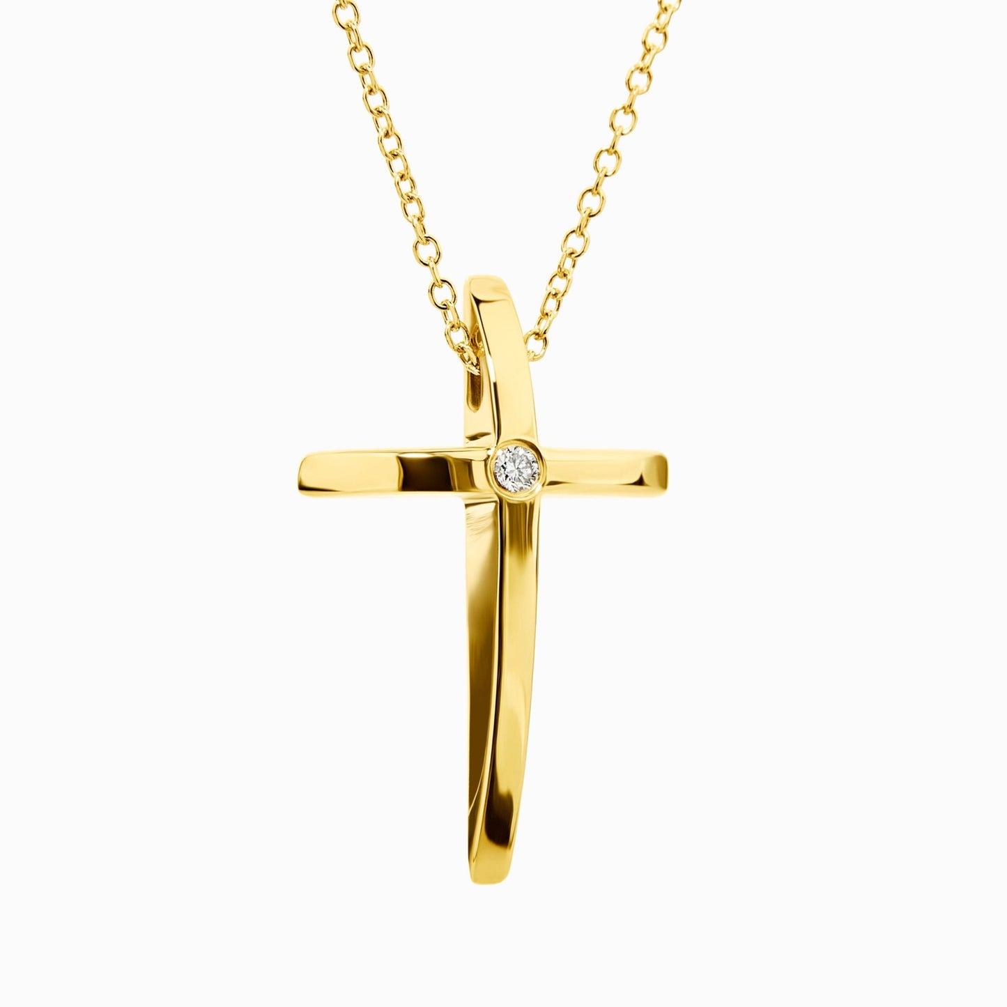 Gold cross pendant necklace on a white background