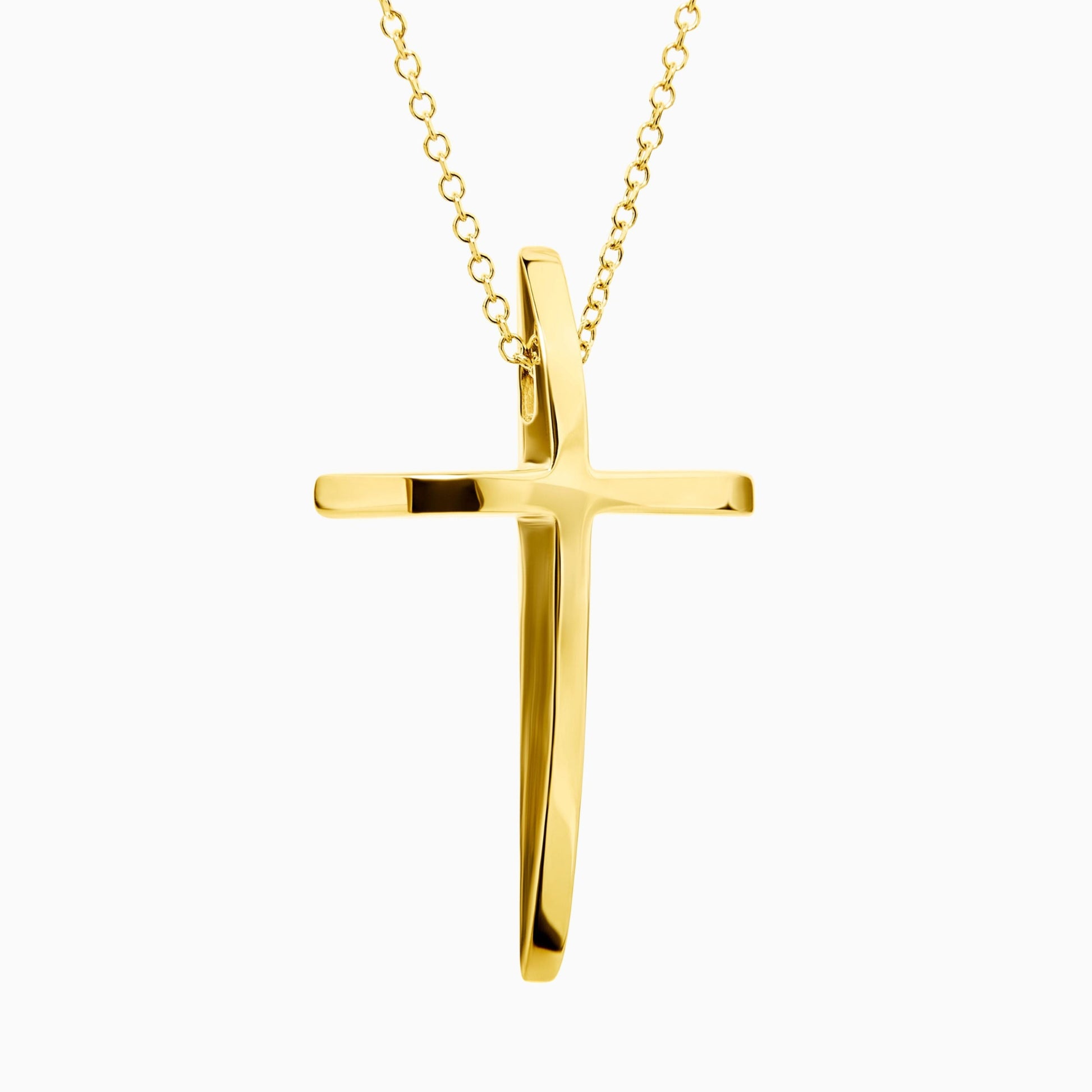 Gold cross pendant on a chain against a white background