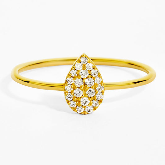 Gold ring with a teardrop-shaped diamond design on a white background