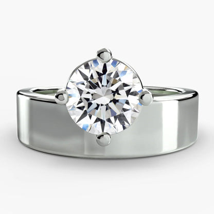 Silver ring with a large diamond on a white background