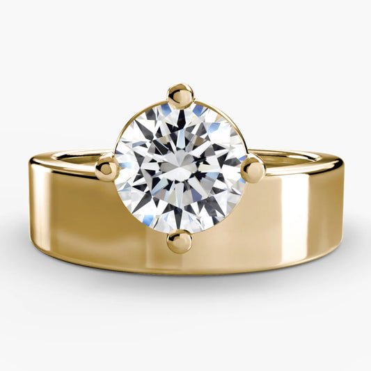 Gold ring with a diamond on a white background