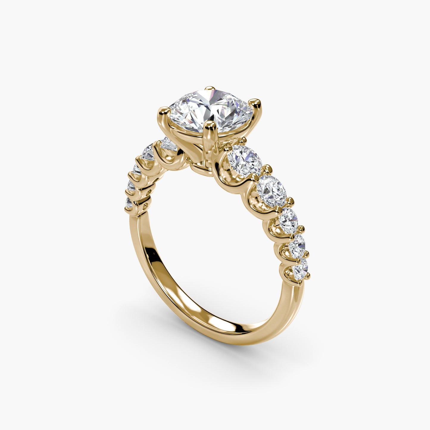 The Graduated Accent Ring Round in Yellow Gold