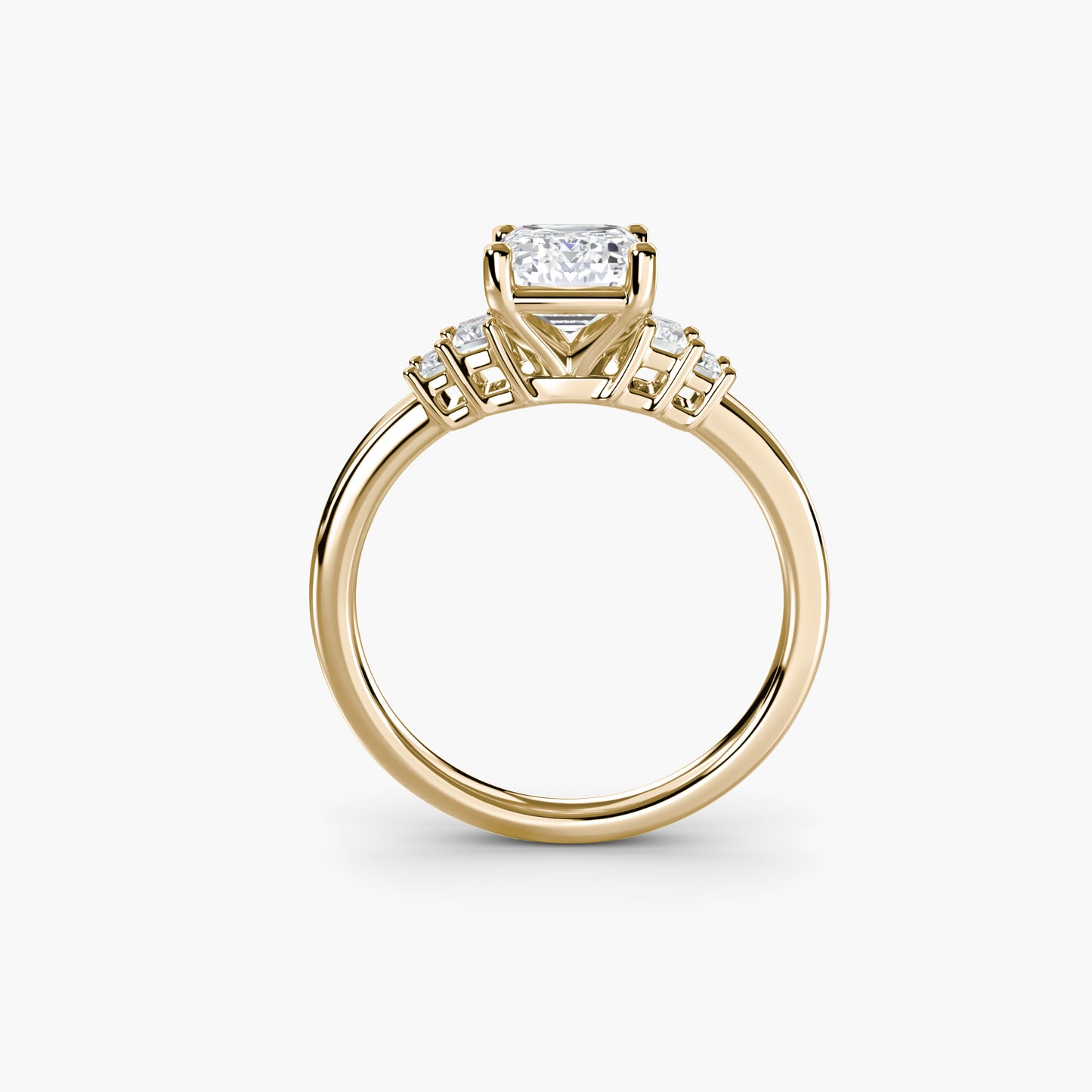 Baguette Accent Solitaire Emerald cut in Yellow Gold