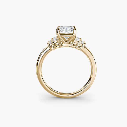 Baguette Accent Solitaire Emerald cut in Yellow Gold