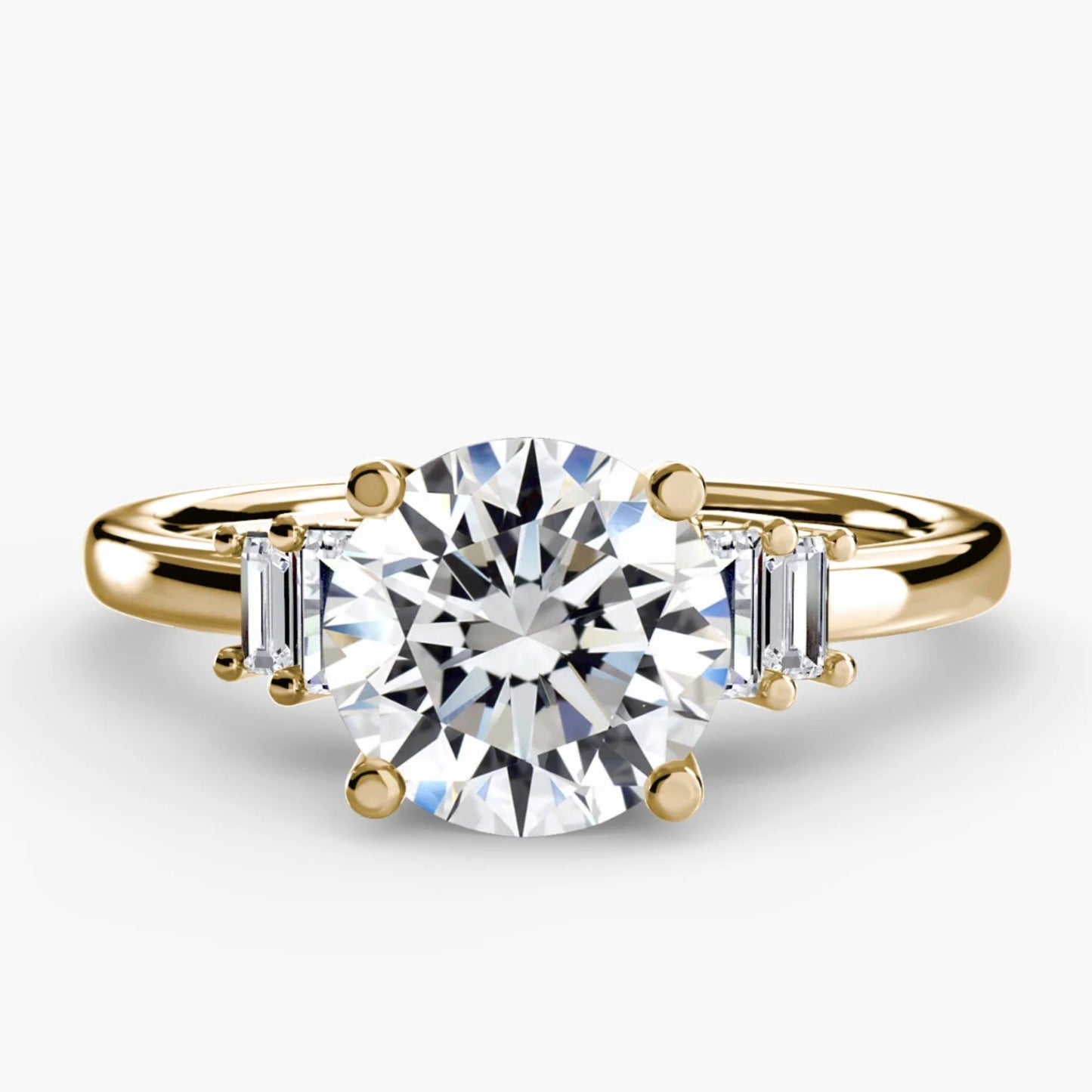 Gold ring with a large diamond and smaller diamonds on the sides against a white background