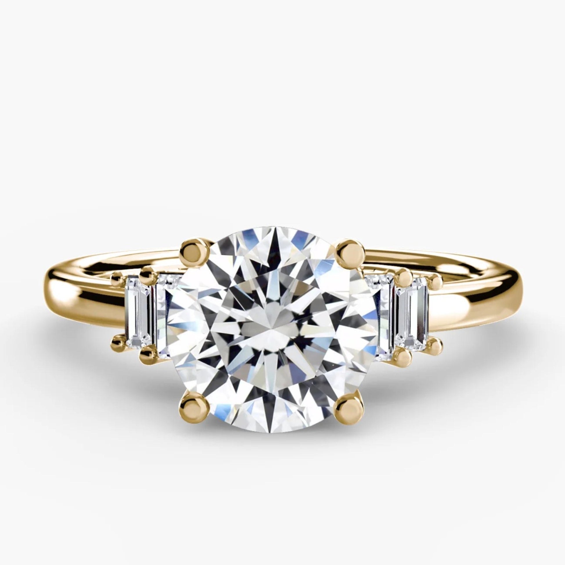 Gold ring with a large diamond and smaller diamonds on the sides against a white background