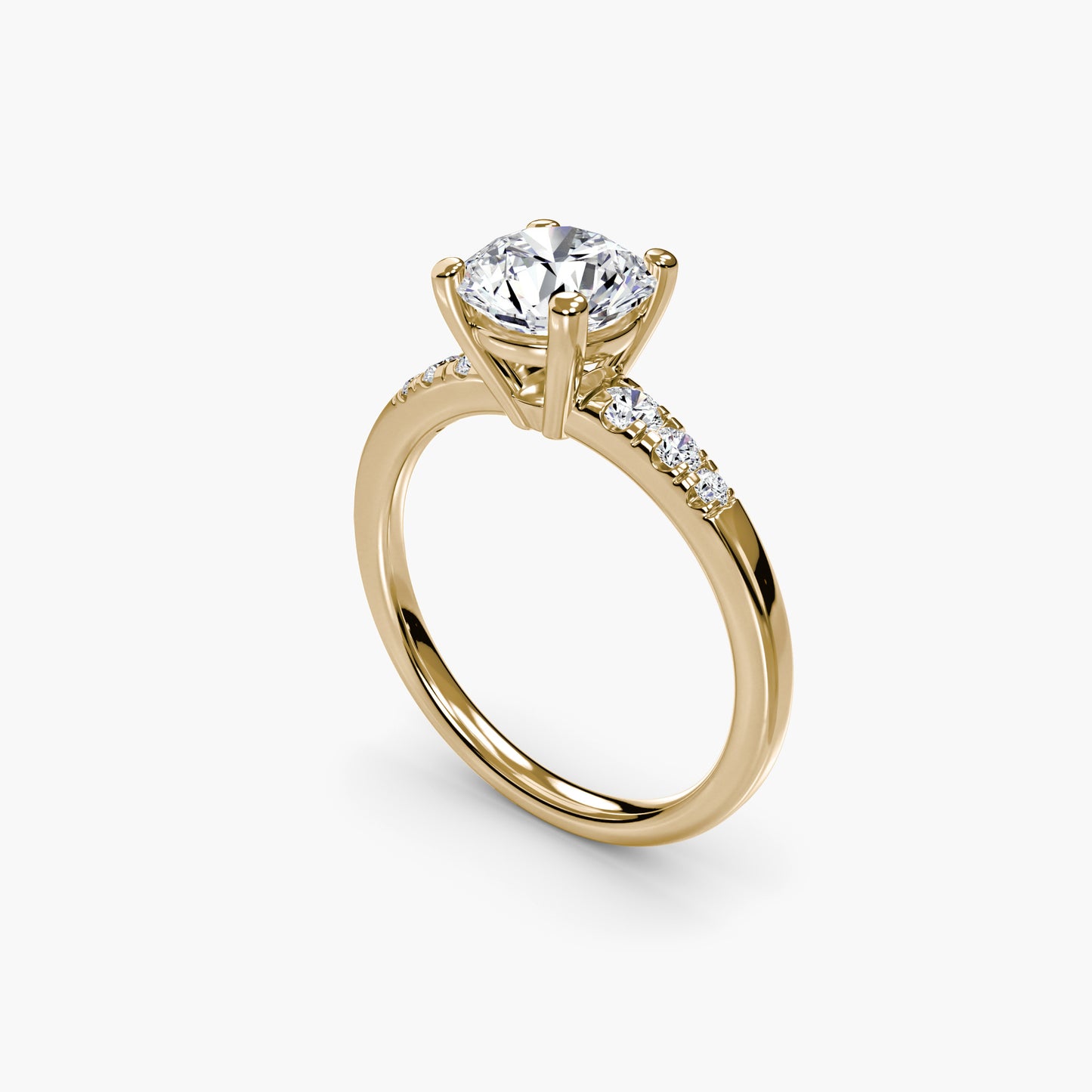 Solitaire with Shoulder Accents Round in Yellow Gold