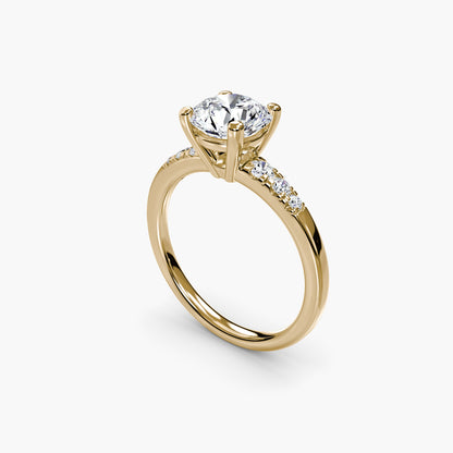 Solitaire with Shoulder Accents Round in Yellow Gold