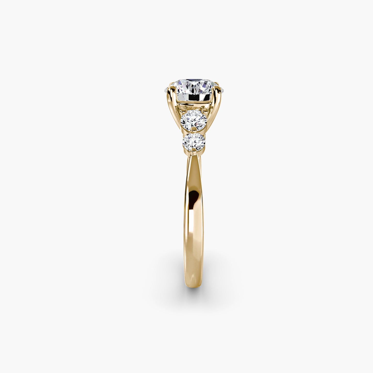 Solitaire with Shoulder Accents 2 Round in Yellow Gold