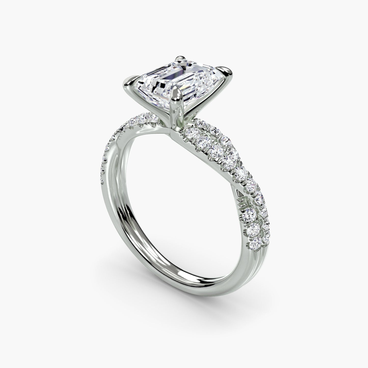 The Twisted Pavé Solitaire Emerald cut in White Gold