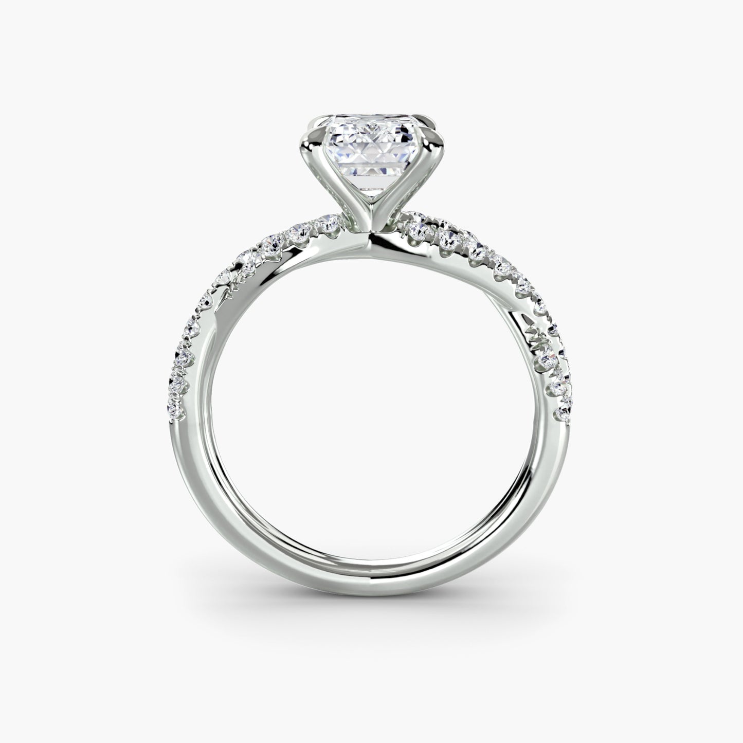 The Twisted Pavé Solitaire Emerald cut in White Gold