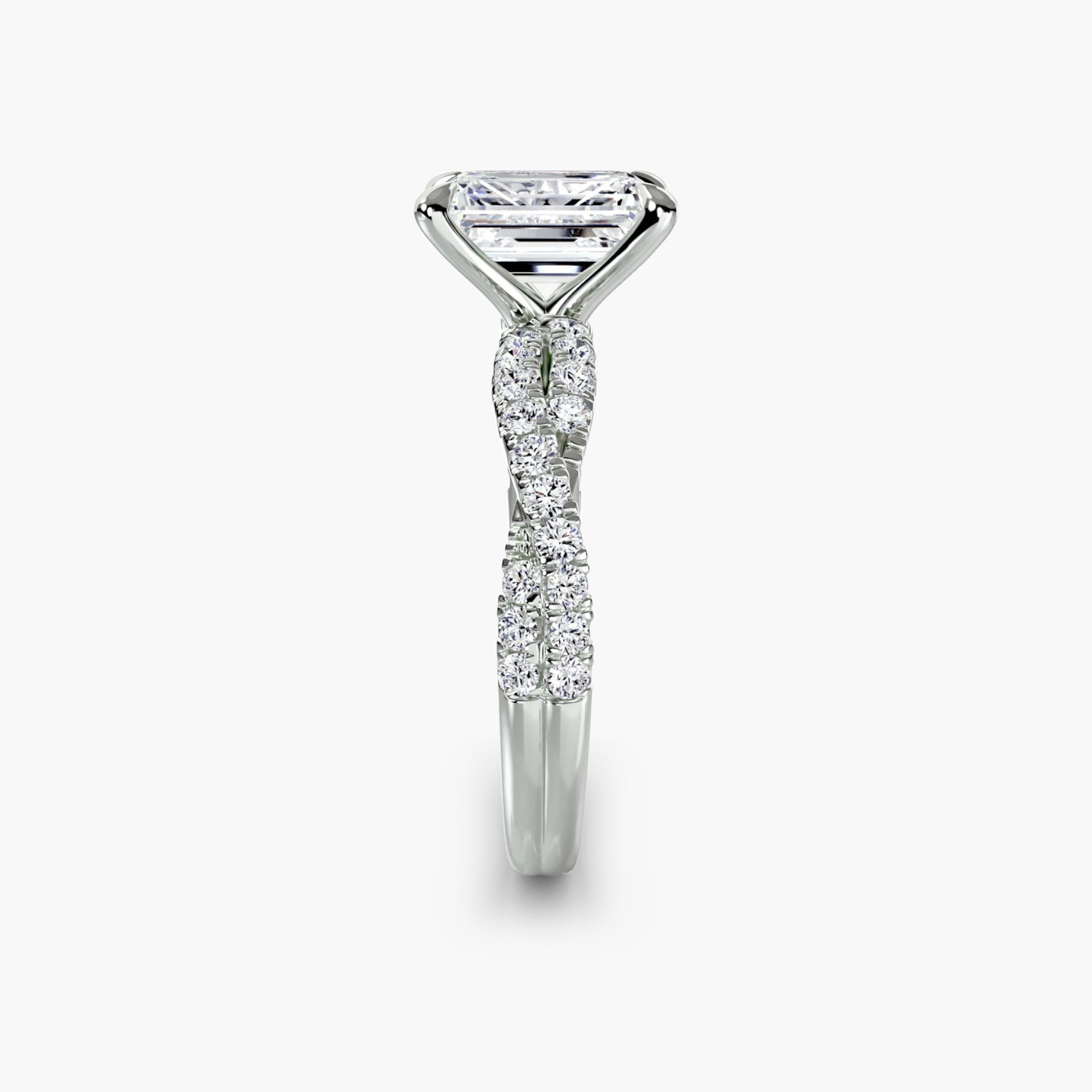 The Twisted Pavé Solitaire Emerald cut in White Gold