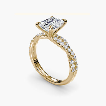 The Twisted Pavé Solitaire Emerald cut in Yellow Gold