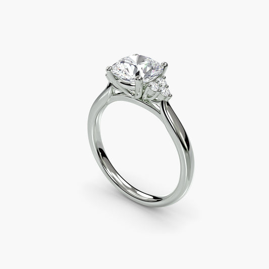 Solitaire with Cluster Shoulders in White Gold