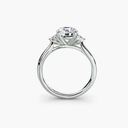 Solitaire with Cluster Shoulders in White Gold