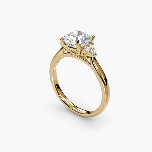 Solitaire with Cluster Shoulders in Yellow Gold