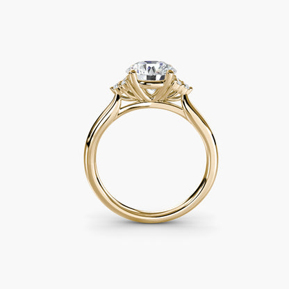 Solitaire with Cluster Shoulders in Yellow Gold