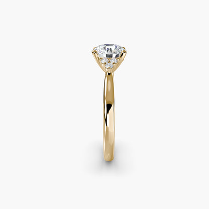 Solitaire with Cluster Shoulders in Yellow Gold