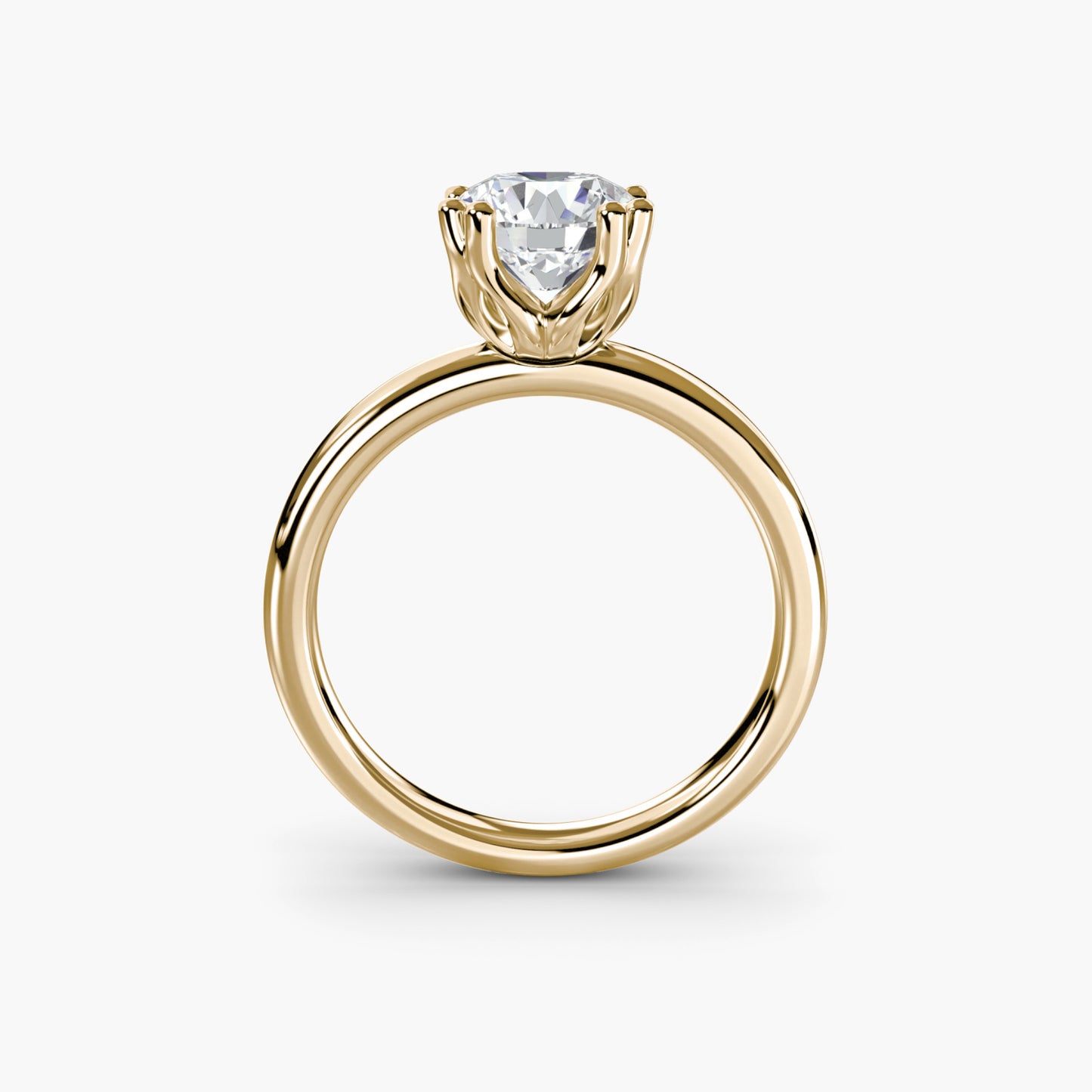 Solitaire ring 5 Round in Yellow Gold