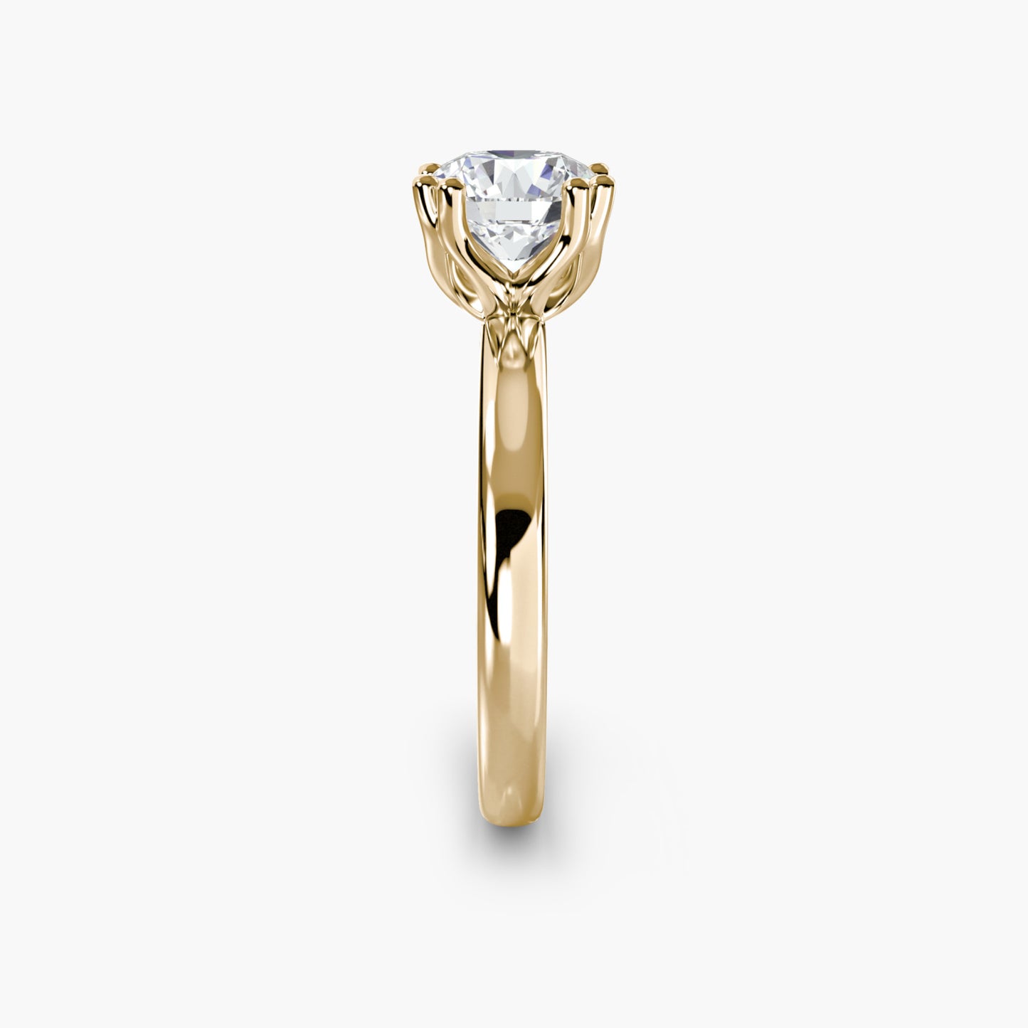 Solitaire ring 5 Round in Yellow Gold