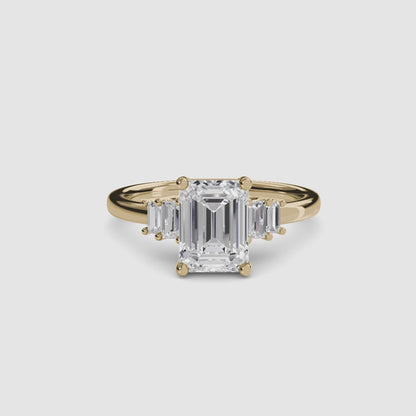Baguette Accent Solitaire Emerald cut in Yellow Gold