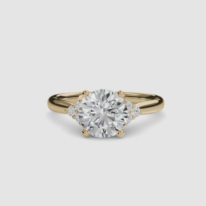 Solitaire with Cluster Shoulders in Yellow Gold