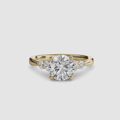 Solitaire with Shoulder Accents 2 Round in Yellow Gold